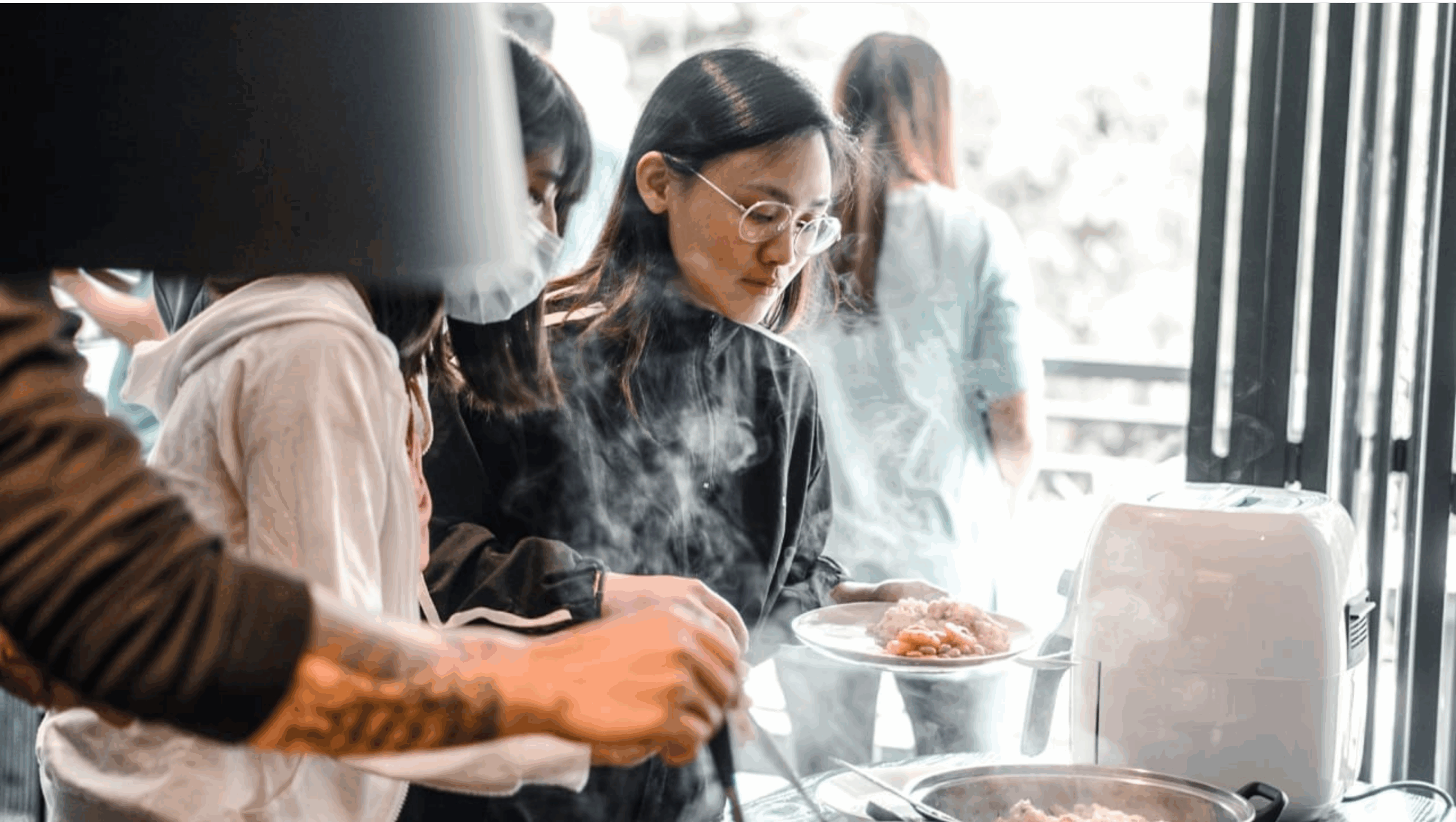 People sharing hot meal